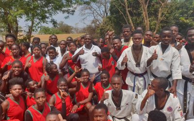 MINISTER VISITS ATHLETES IN CAMP