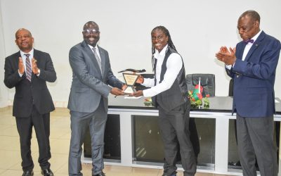 HONOURABLE MINISTER OF YOUTH AND SPORTS HANDS OVER RASA TROPHY TO TABITHA CHAWINGA